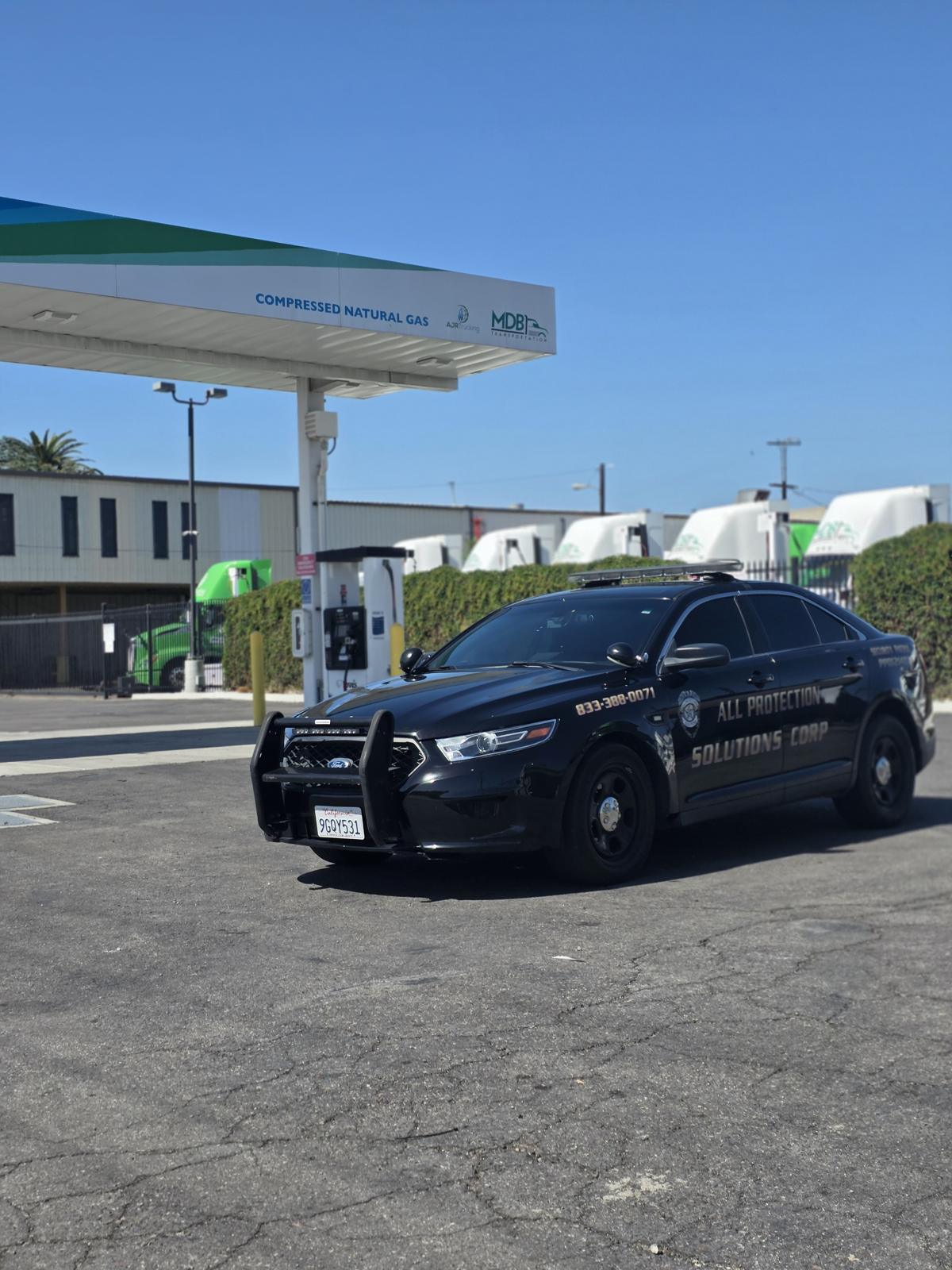 Real APS Security patrol car on duty at a commercial property